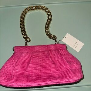 A New Day Pink Woven Clutch